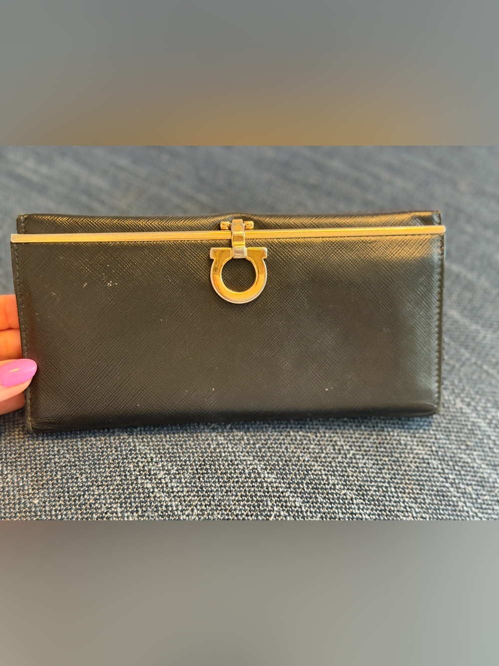 Salvatore Ferragamo Gancini long continental wallet in black leather.